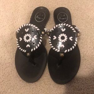 Black and white jack Rogers flip flops